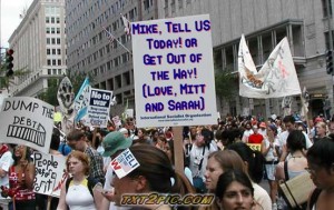 Protest Sign: Mike, Tell Us Today or Get out the Way (Love, Mitt and Sarah)